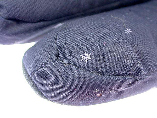 Snowflakes on glove tip