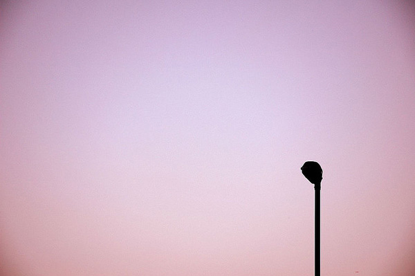 A lamp post at sunset