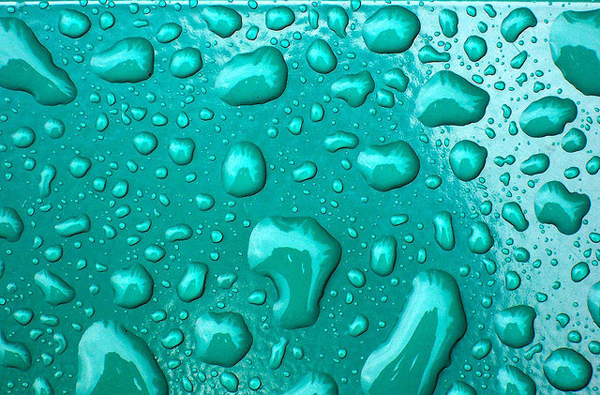 Water droplets on a shiny surface