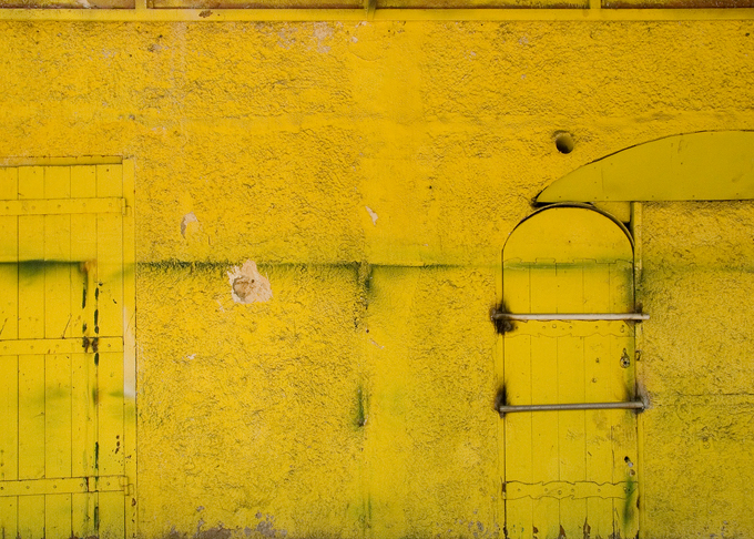 Yellow and aged wall and doors