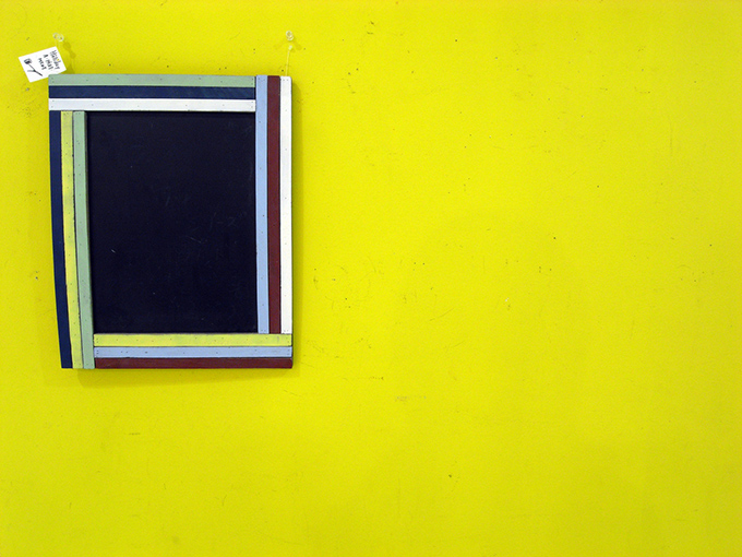 Yellow wall with frame