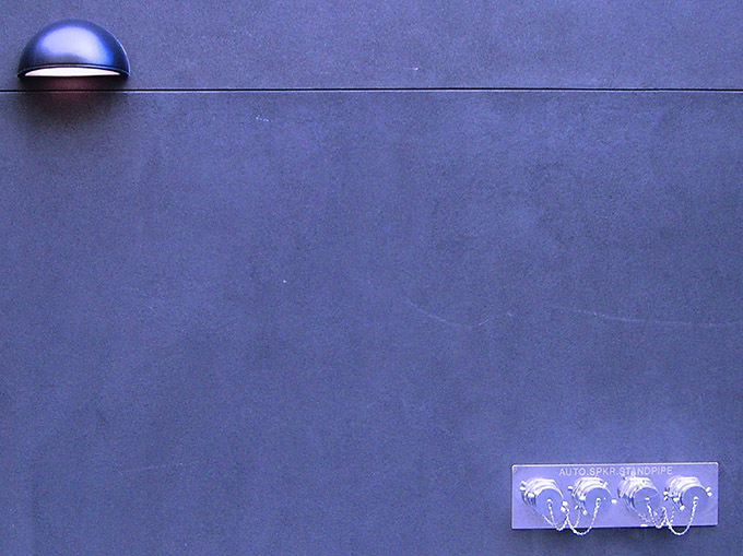 blue wall with light and connectors