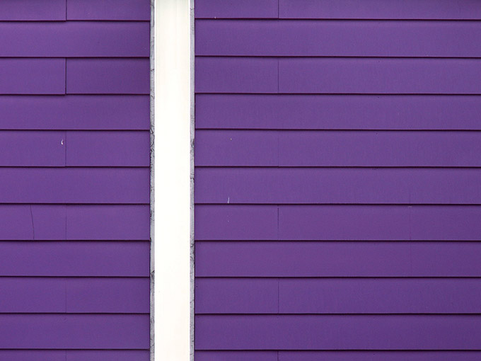 Purple weatherboard wall