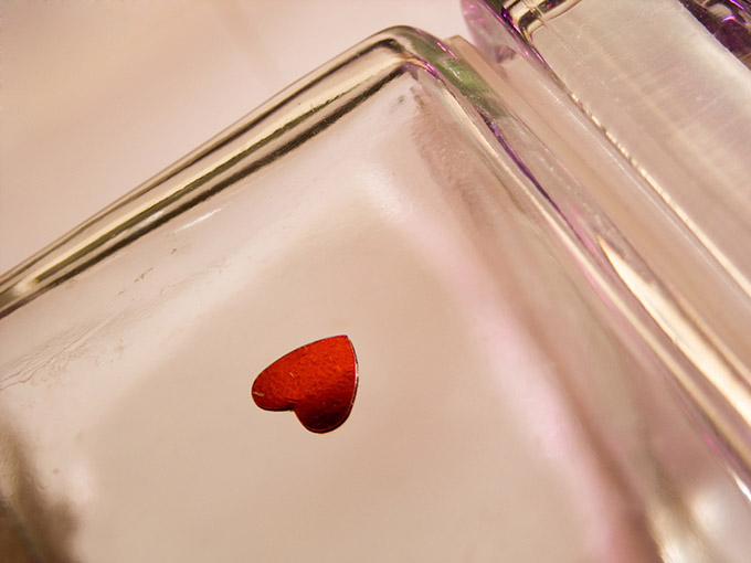 Red heart shape in a glass jar